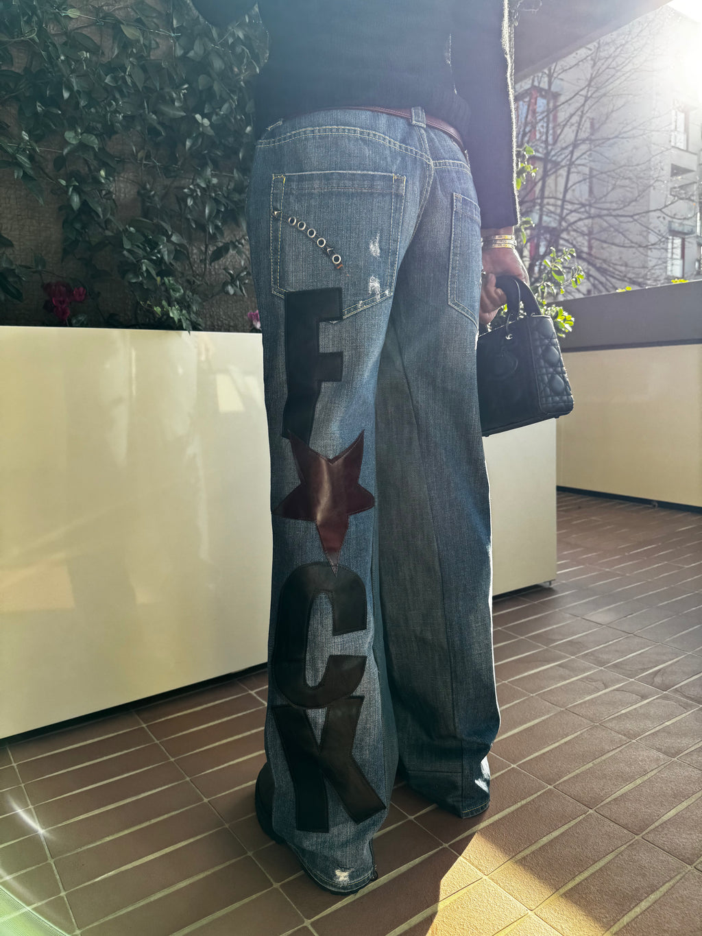 F*CK- vida denim con borchie