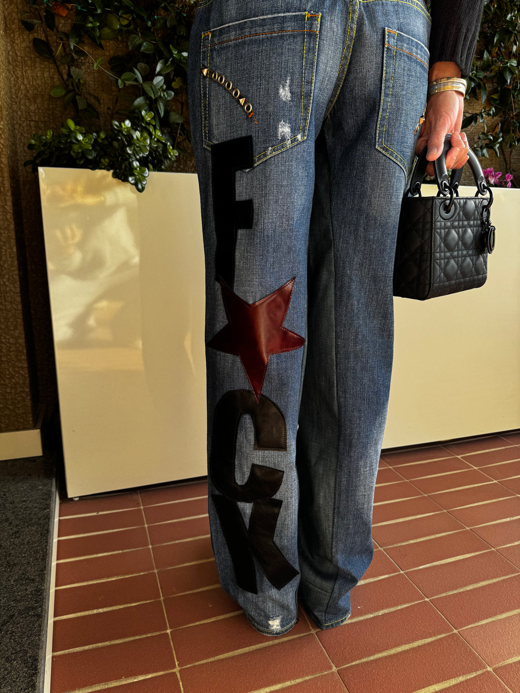 F*CK- vida denim con borchie