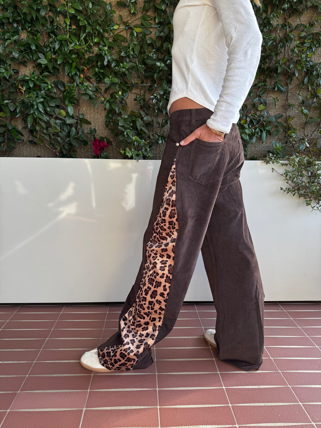 Trussardi trousers featuring a cheetah-print insert