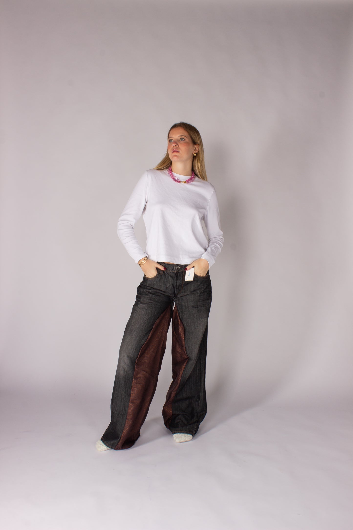 Pantalone nero con inserto broccato marrone