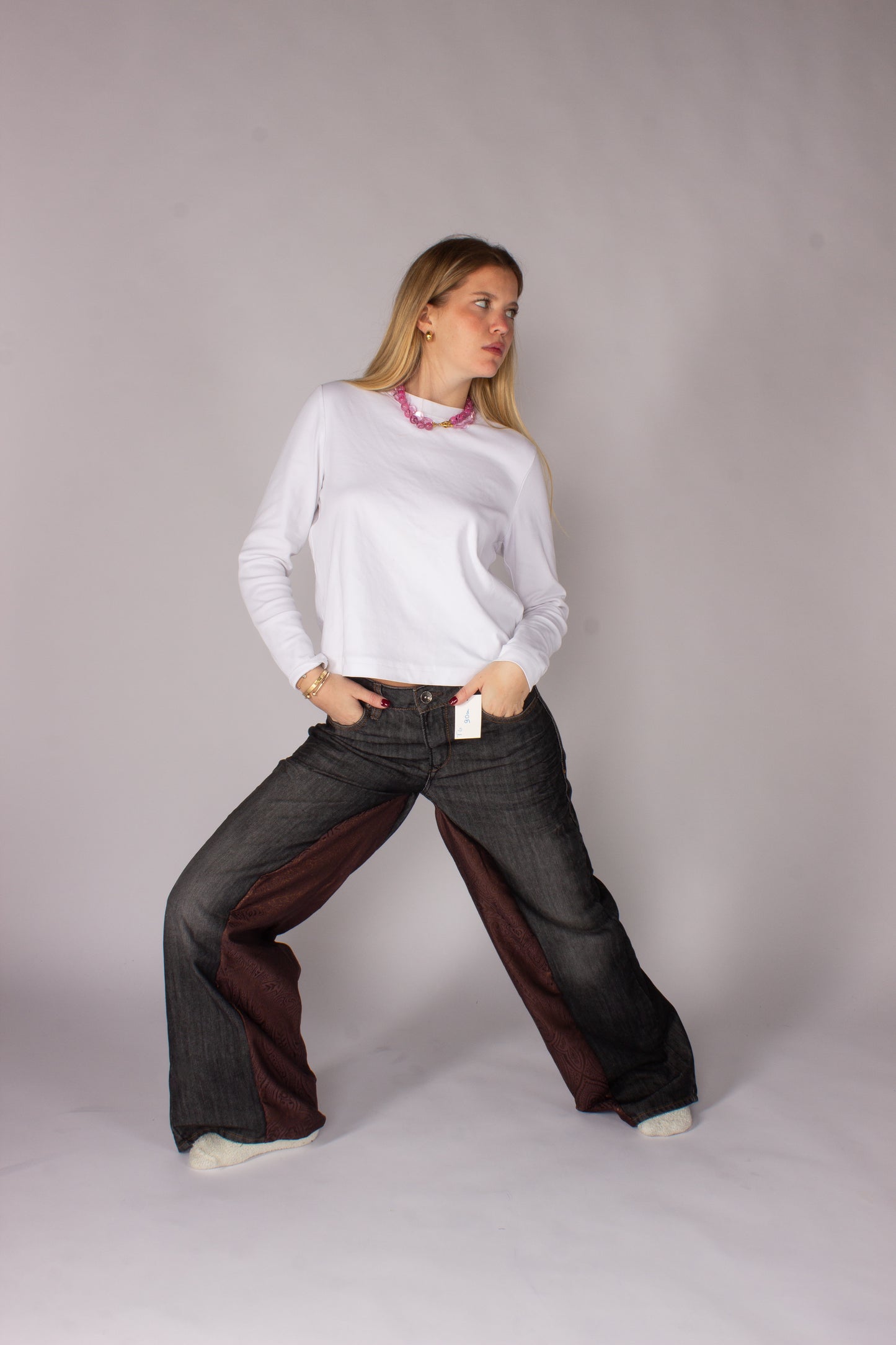 Pantalone nero con inserto broccato marrone